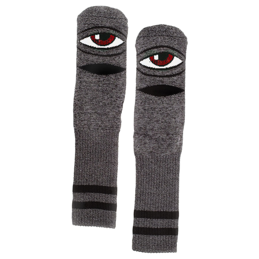 Pair of heather black toy machine skateboard socks with eye design on a white background
