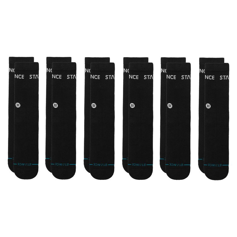 6 pack of black socks with stance on a white background