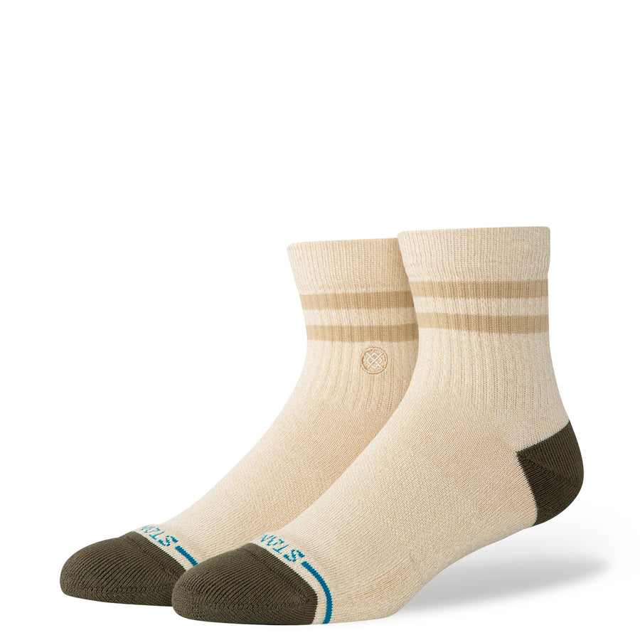 Pair of beige Stance marled quarter socks with brown accents on a white background