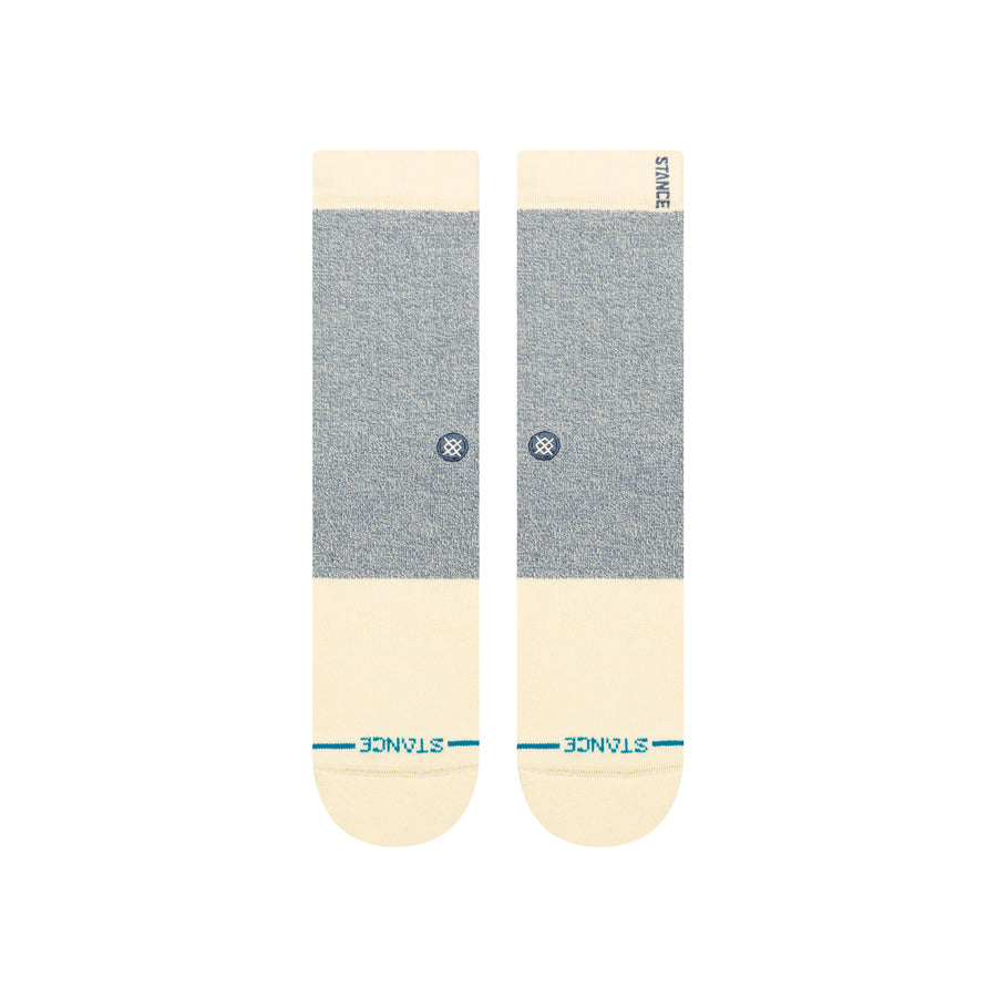 Pale yellow and heather blue stance butterblend socks on a white background