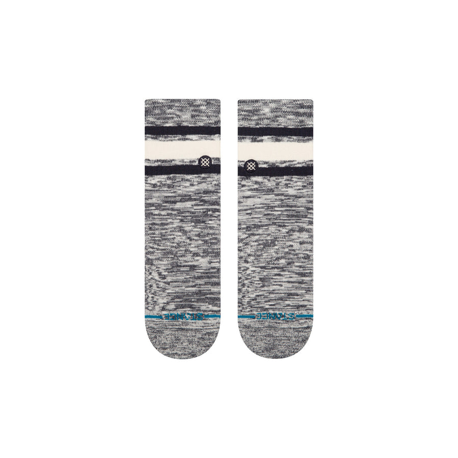 Pair of gray and white socks with a stance logo on a white background