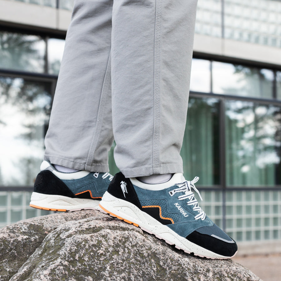 black and green karhu men's comfort shoe with orange detail