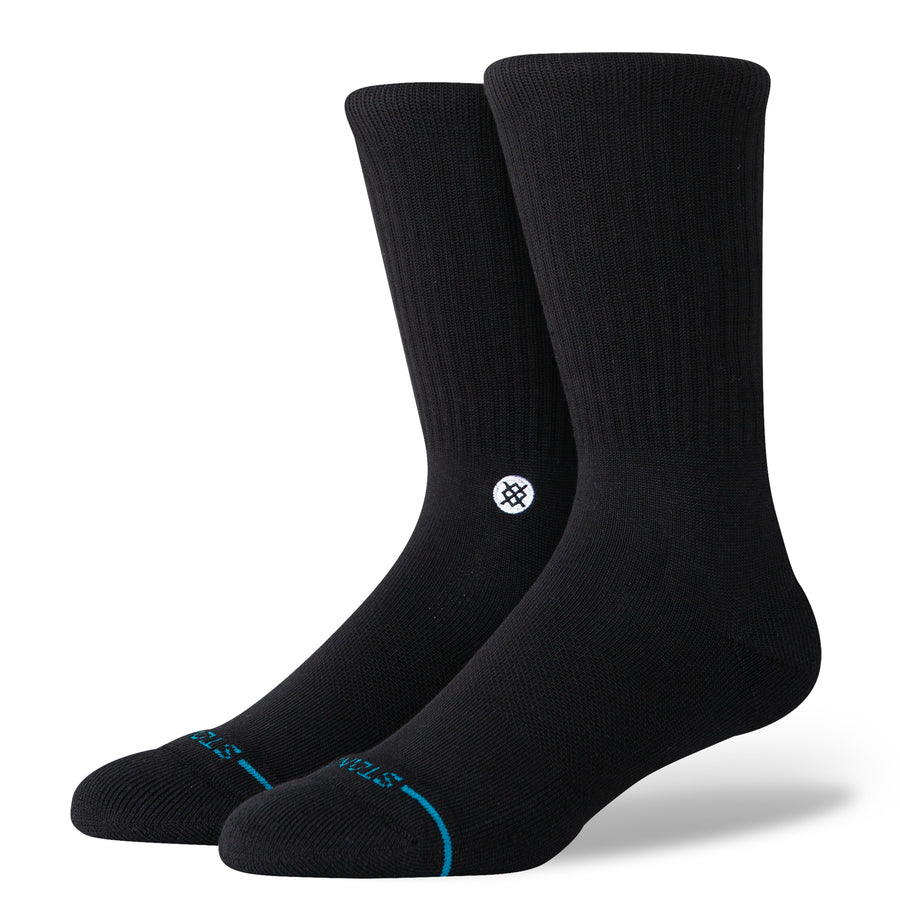 MEN'S BLACK STANCE CREW SOCKS WITH WHITE STANCE INCON LOGO AT THE HEEL