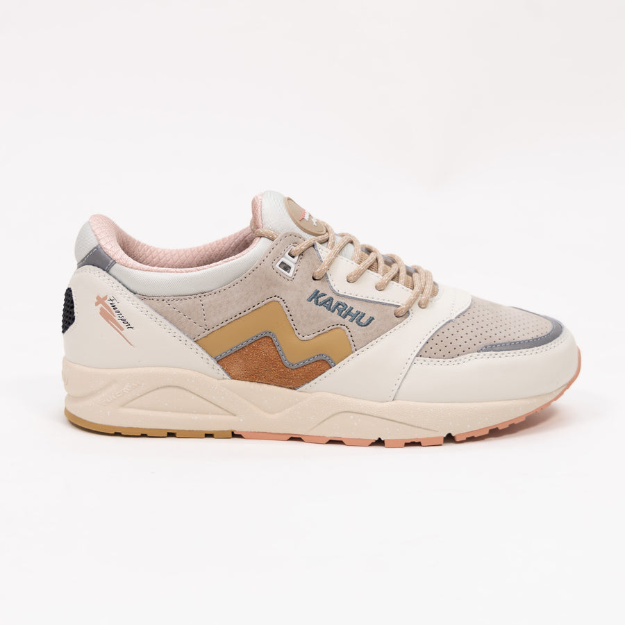 off white karhu women's comfort shoe with gold and orange detail