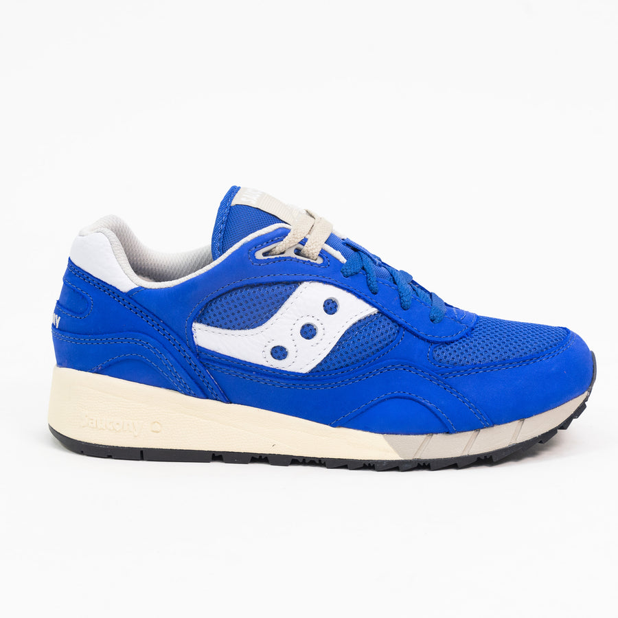blue saucony shadow 6000 men's comfort shoe with white detail and an off white sole