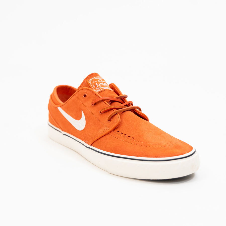 orange red nike sb stefan janoski men's skate shoe with white swoosh and white sole