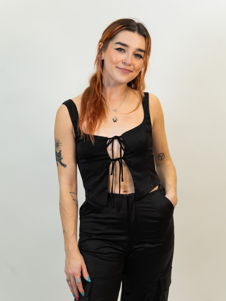 black nia Linen corset featuring bow-tie closures and scallop edge lace