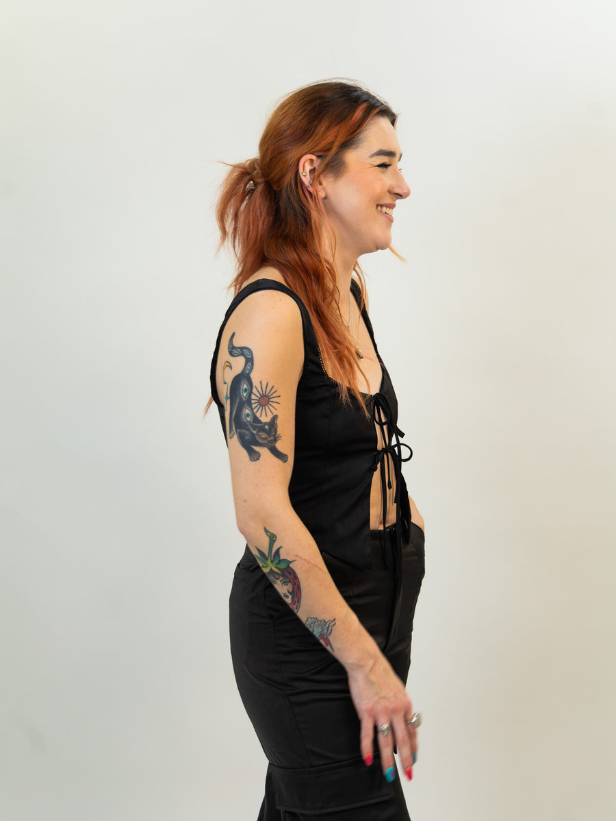 black nia Linen corset featuring bow-tie closures and scallop edge lace