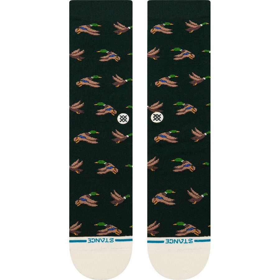 Dark green stance huntin socks with duck pattern on a white background