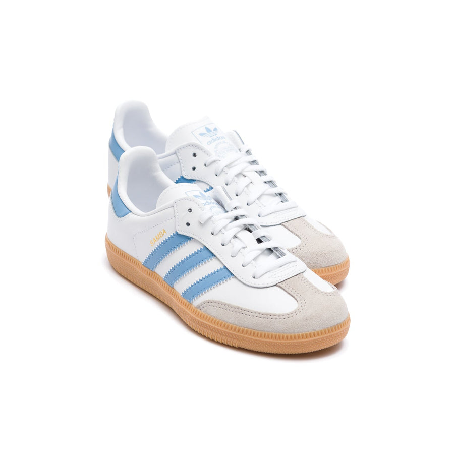 white adidas kids samba og with blue stripes and gum sole