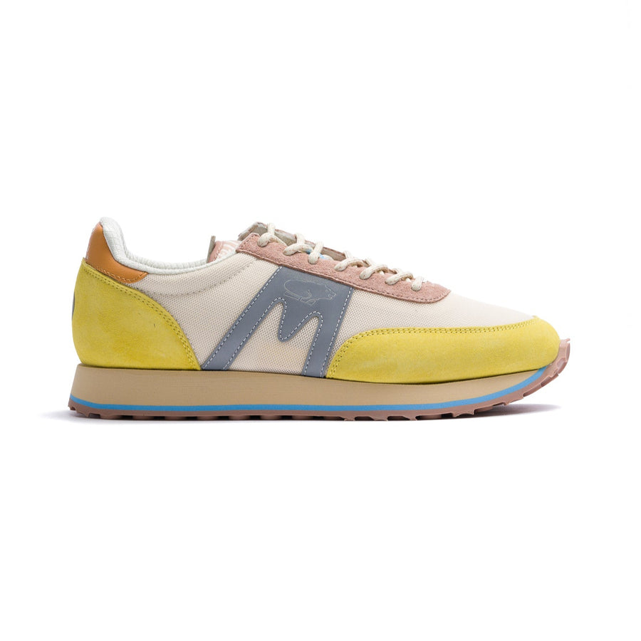 yellow, tan and grey karhu women's albatross control sneaker