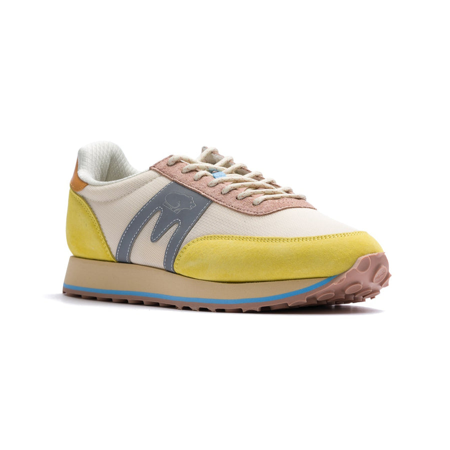 yellow, tan and grey karhu women's albatross control sneaker