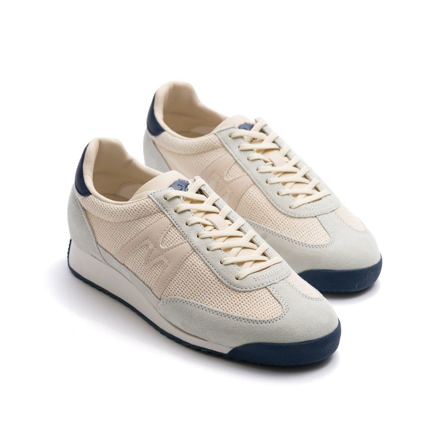 grey and off white karhu women's mestari sneaker with off white and navy sole