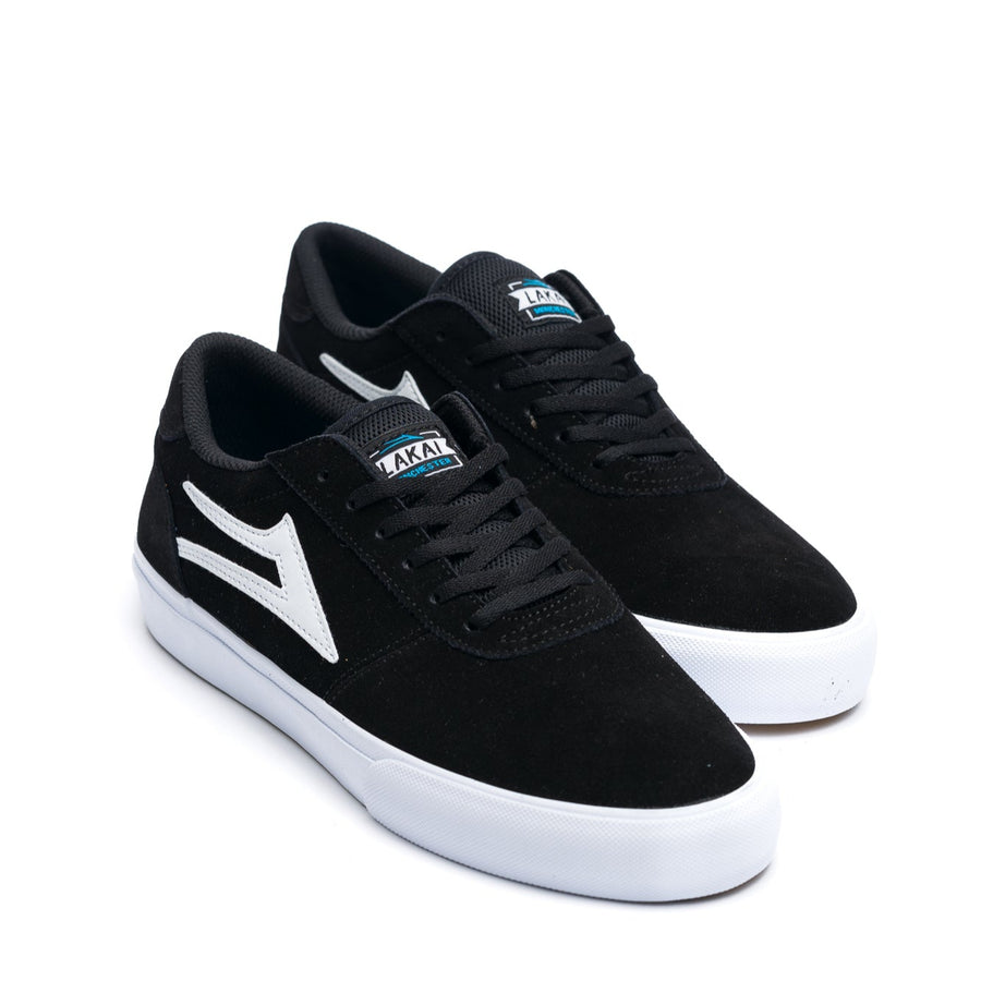 Black lakai manchester skateboarding sneaker with a white logo on a white background