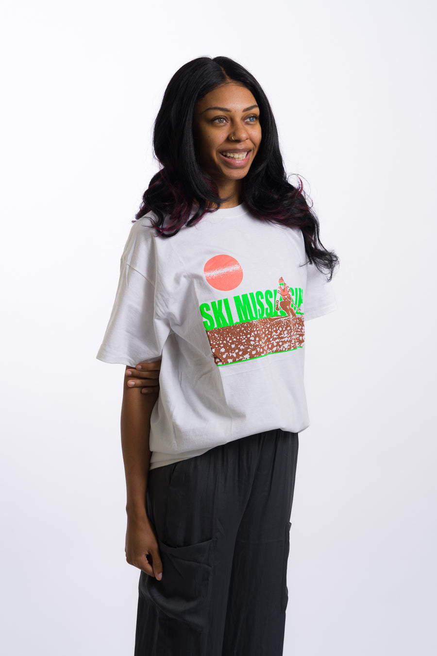 white short sleeve tee shirt with lime green ski mississippi on the front