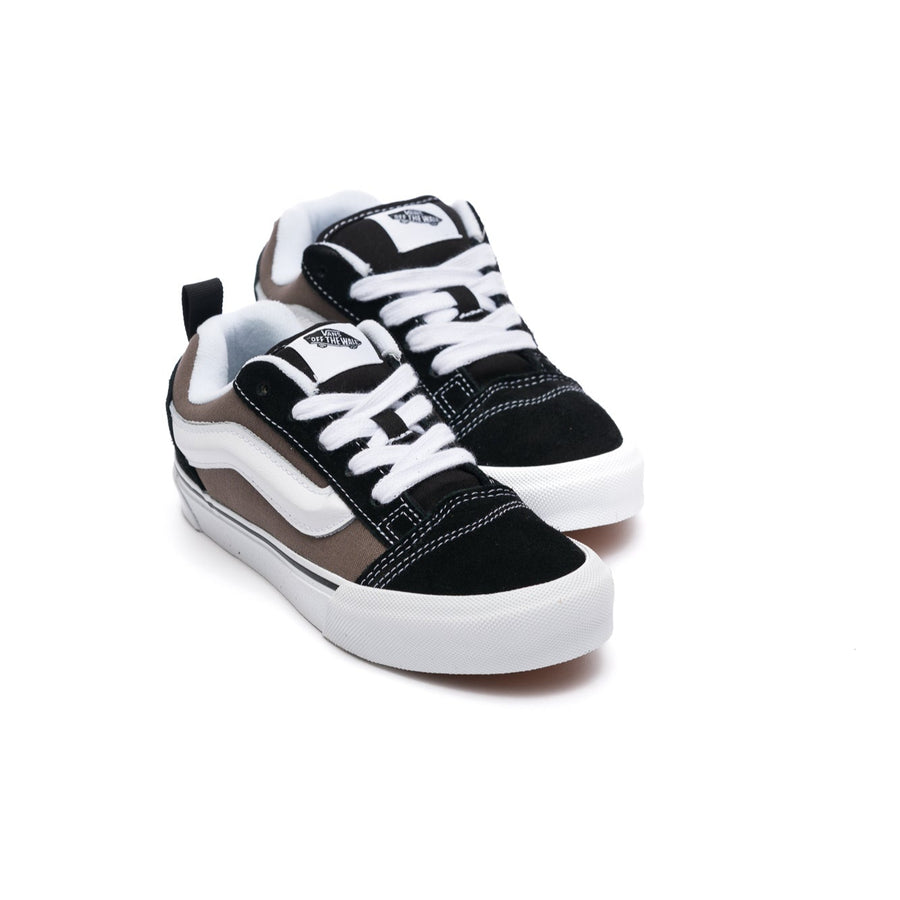 black and brown 2-tone vans kids knu skool with white stripe and sole on a white background