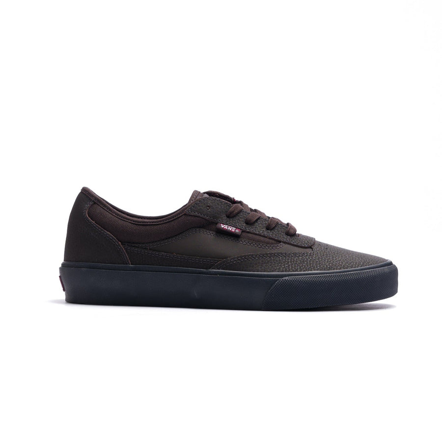brown vans men's curren caples skateboard shoe with blue black soles