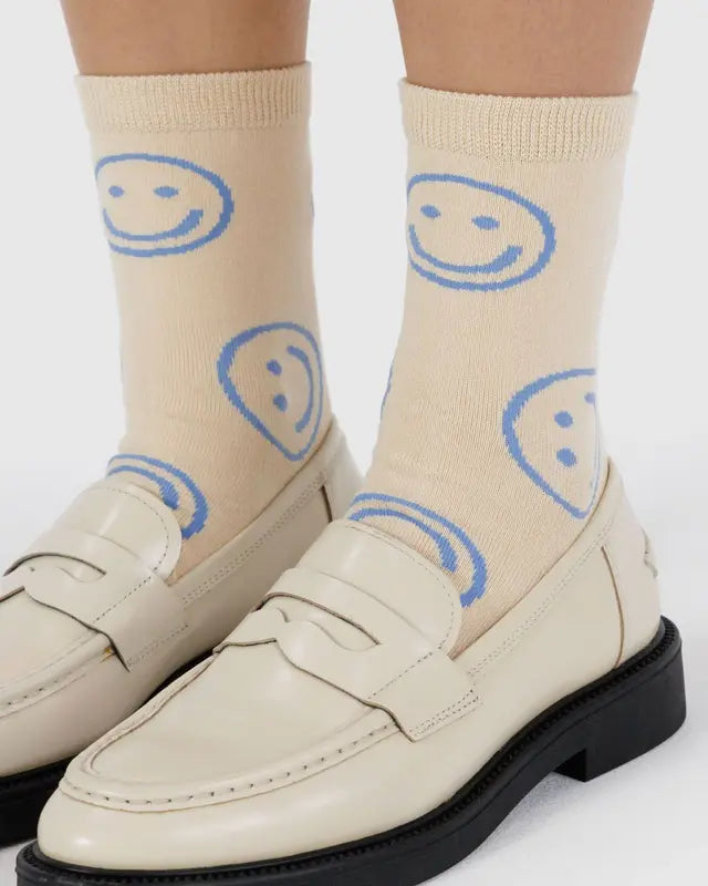 off white baggu crew sock with light blue smiley faces