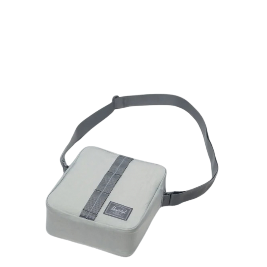grey reflective herschel ripstop heritage crossbody bag on a white background