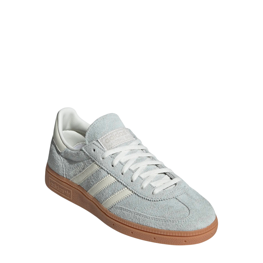 Light blue Adidas handball spezial sneaker with white stripes on a white background