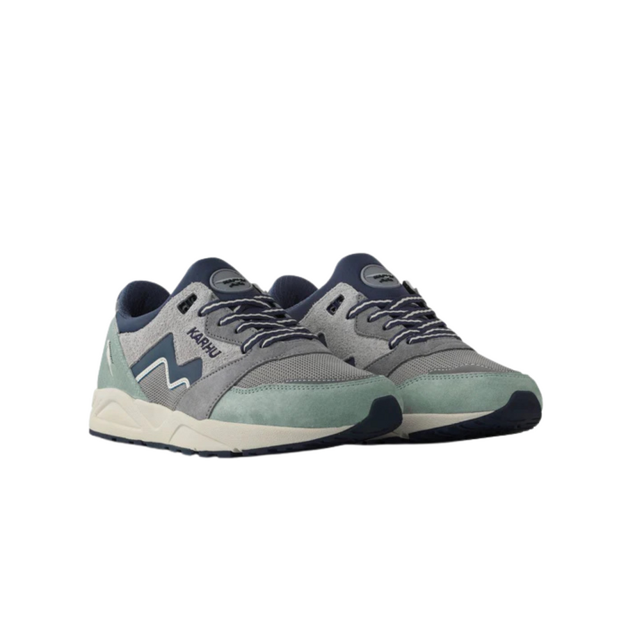 Gray and green karhu aria 95 legends sneaker with 'Karhu' branding on a white background