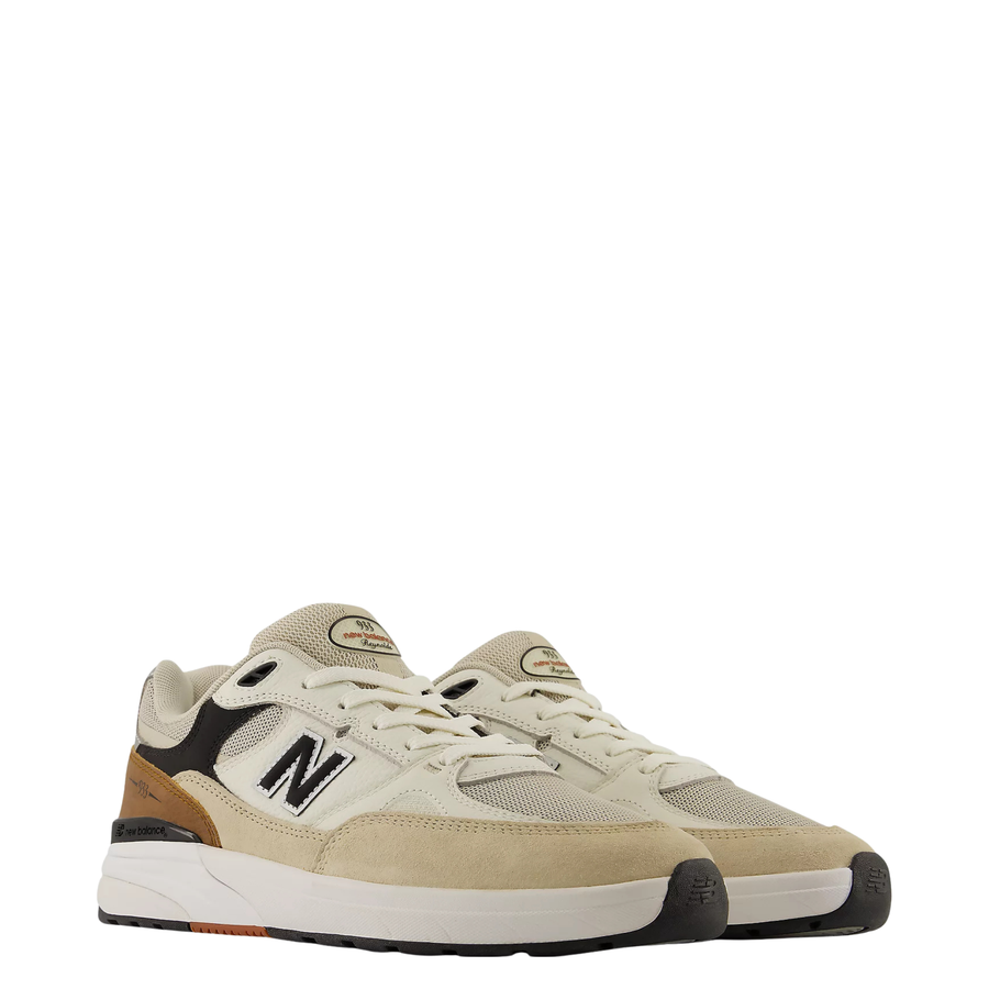 tan and brown men's new balance numeric andrew reynolds 933 skate shoe on a white background