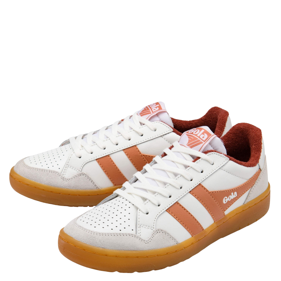 White and orange eagle '86 women's sneaker with 'Gola' branding on a white background & gum soles