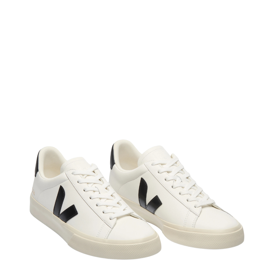white veja campo leather shoes with black V and off white sole on a white background