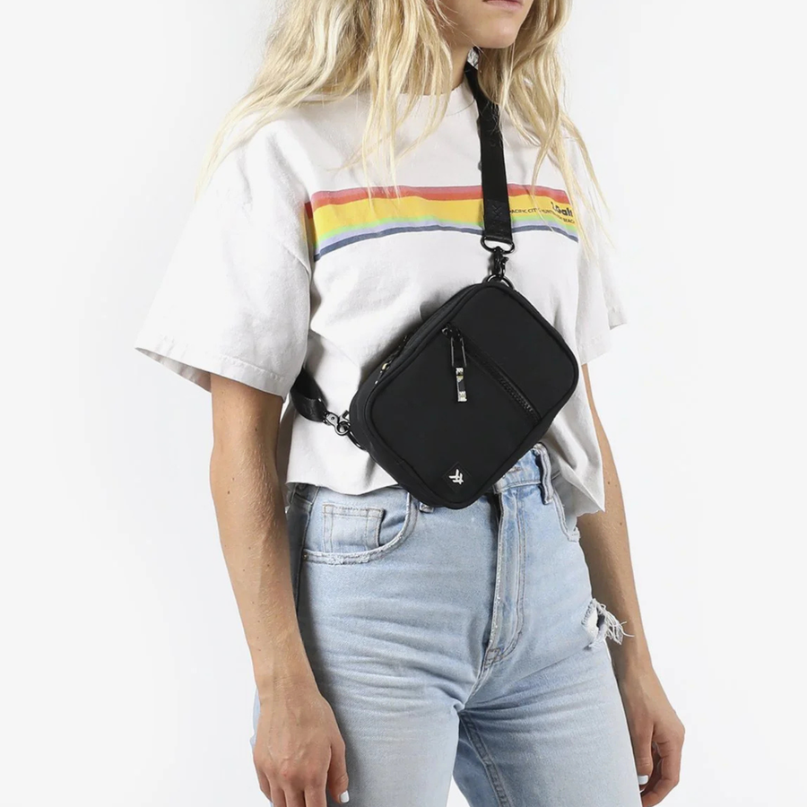 Black thread crossbody bag on a white background