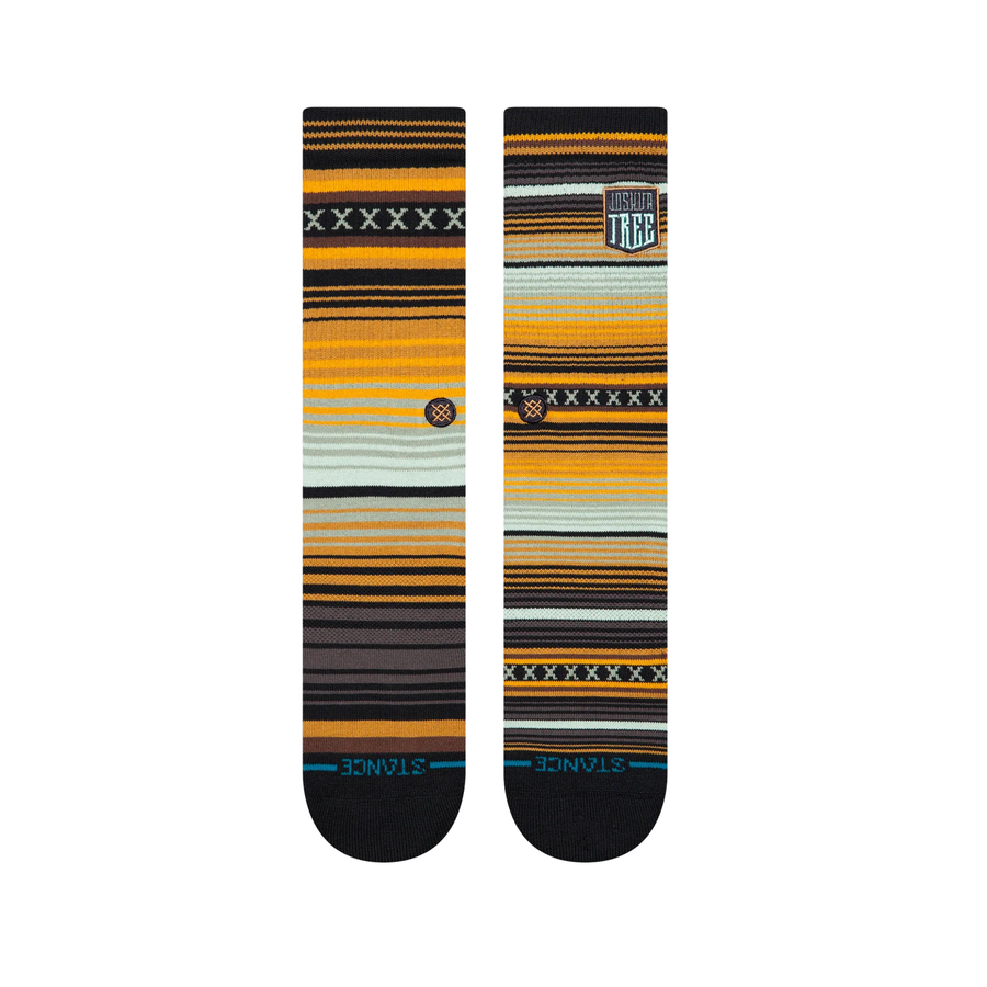 stance joshua tree curren gold & blue striped socks on a white background