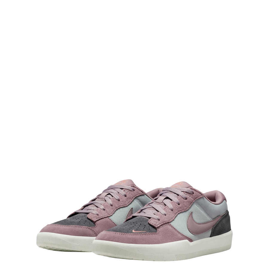 Multicolor NIKE SB women's force 58 sneaker with a pink swoosh on a white background
