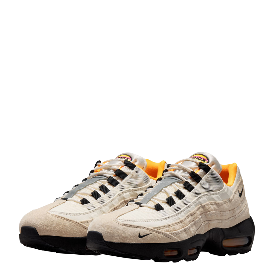 tan nike sb fc pack air max 95 club 58 with black sole and orange detail on a white background