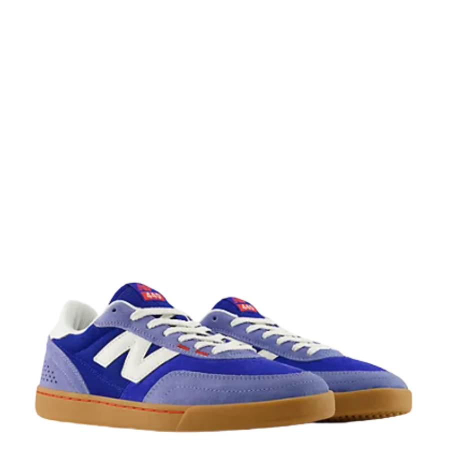 team blue new balance numeric 440v2 with red accents and gum sole