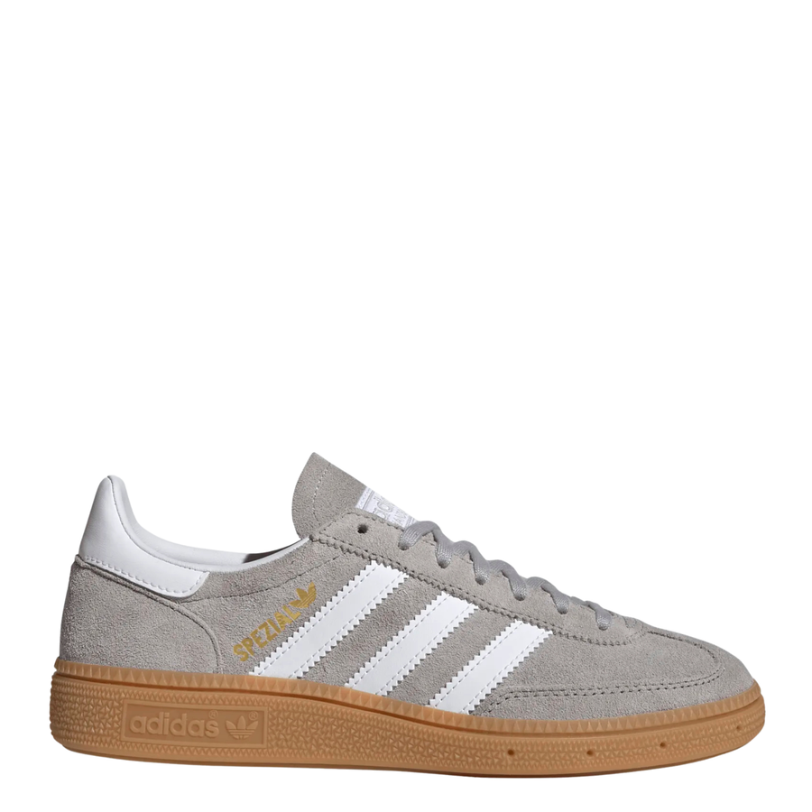 grey adidas handball spezial juniors sneakers with white stripes and gum sole on a white background