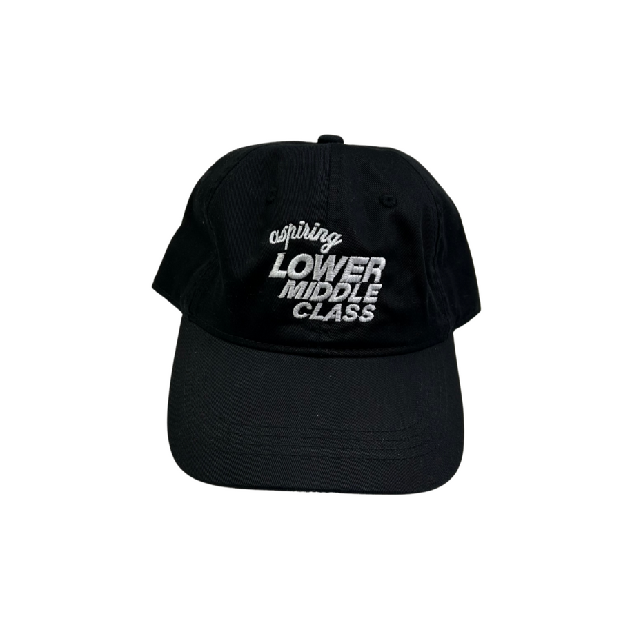 Black cap with white text reading aspiring lower middle class on a white background