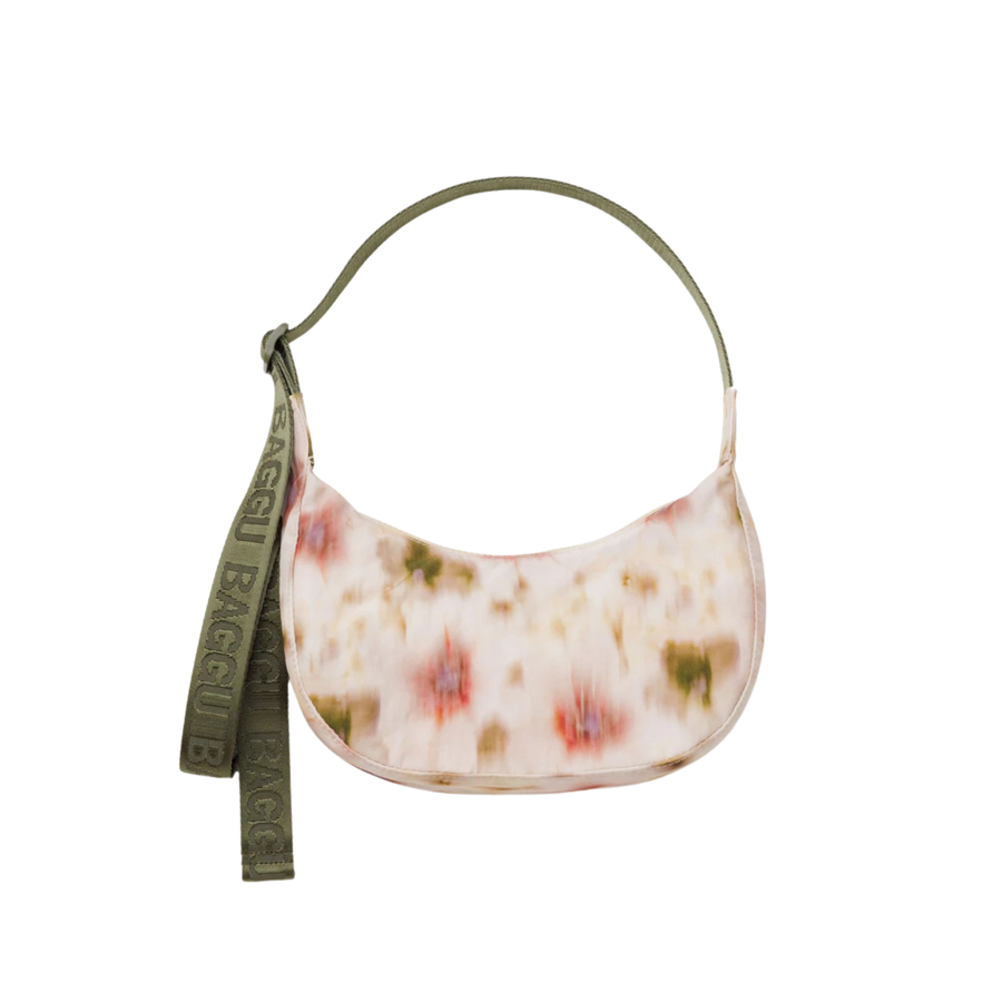 Floral-patterned baggu small crescent nylon handbag with a green strap on a white background