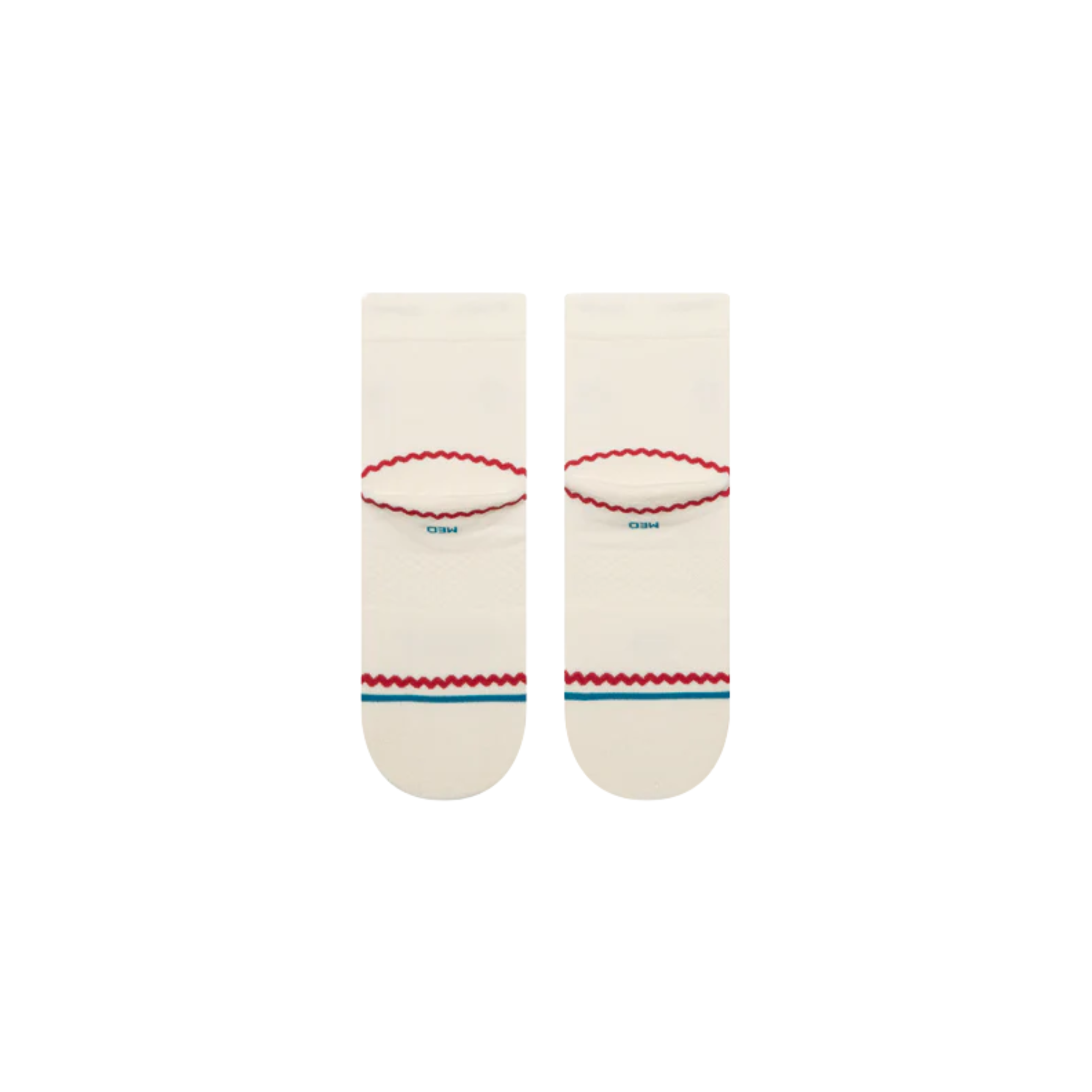 A pair of Stance crew socks in off-white, featuring a black circular logo with a white cross on the front ankle, a small red strawberry graphic on the side, and red and blue wavy stripe accents near the toe.