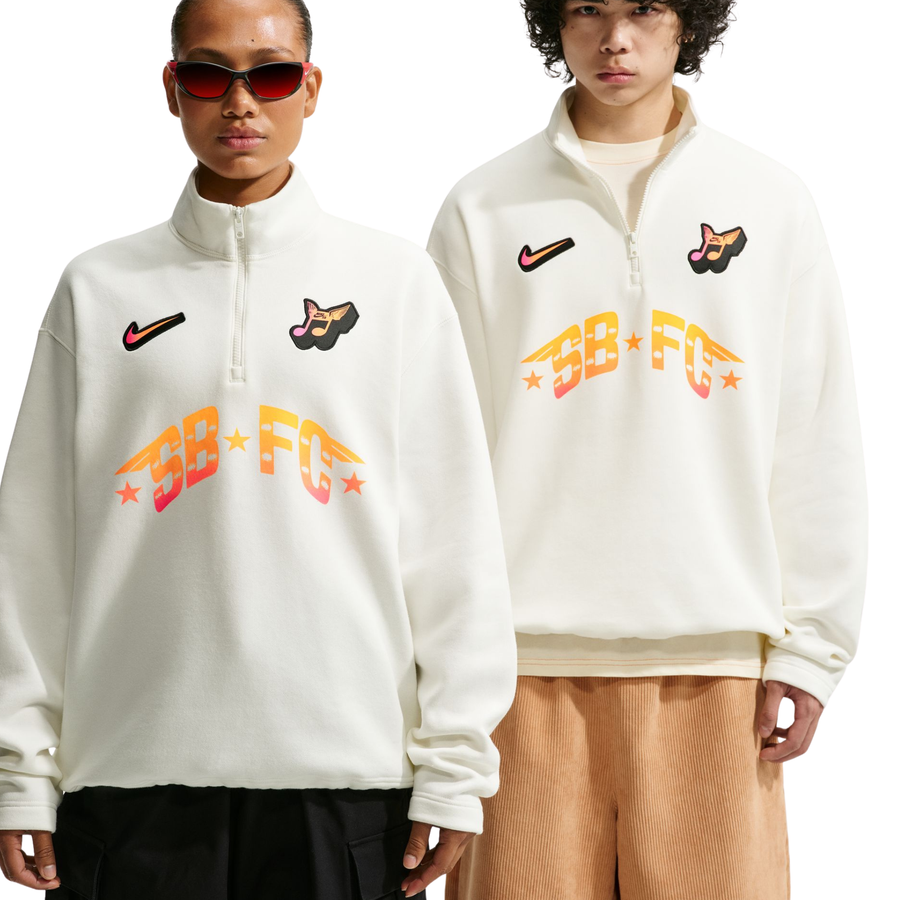 Two people wearing white half-zip NIKE SB FC PACKsweatshirts with logos and text on a white background