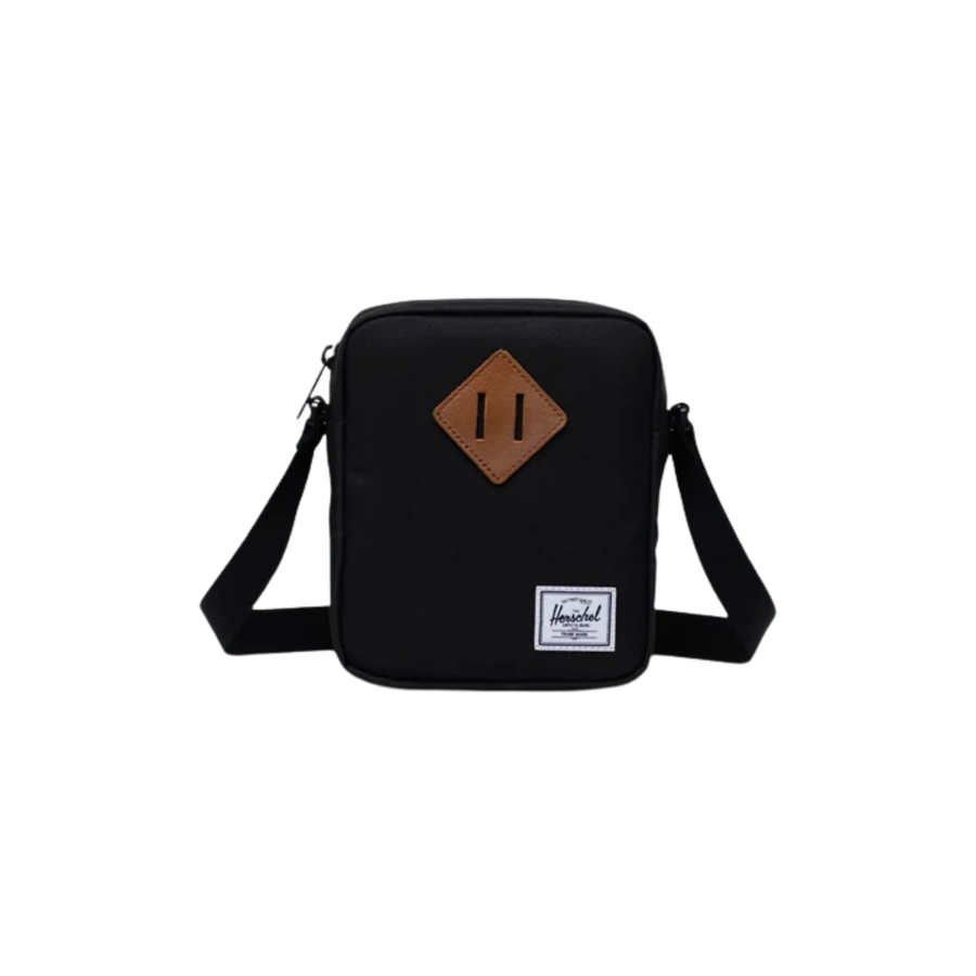 black herschel heritage crossbody bag on a white background