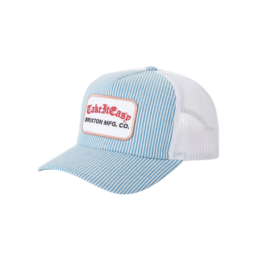 Blue and white striped brixton take it easy trucker hat with a patch on a white background