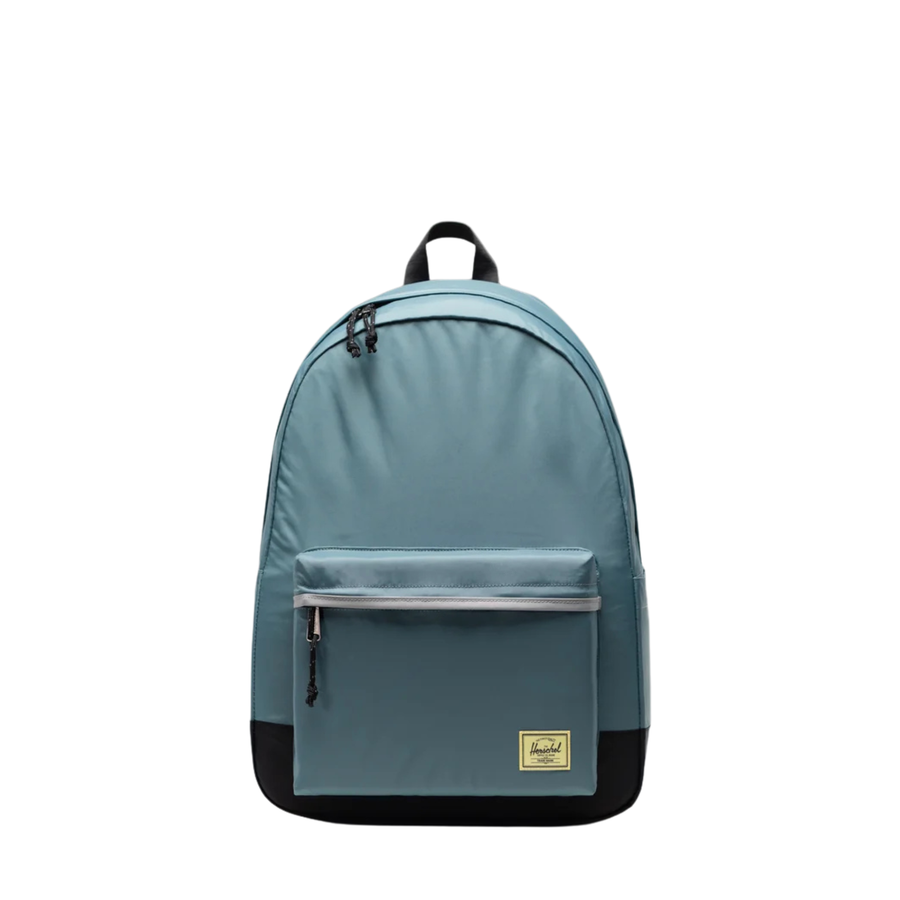 blue herschel classic xl backpack on a white background