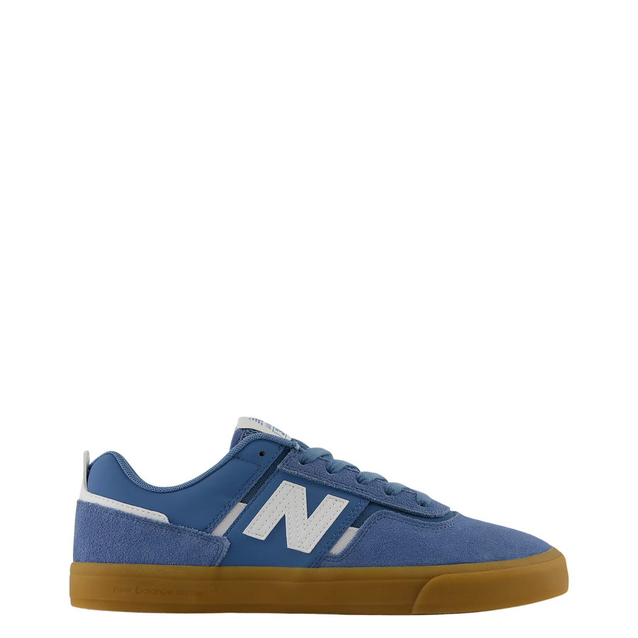 blue men's new balance numeric jamie foy 306 skate shoe with grey details and gum sole on a white background