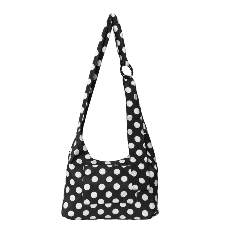 black thread slouchy shoulder bag with white polka dots on a white background