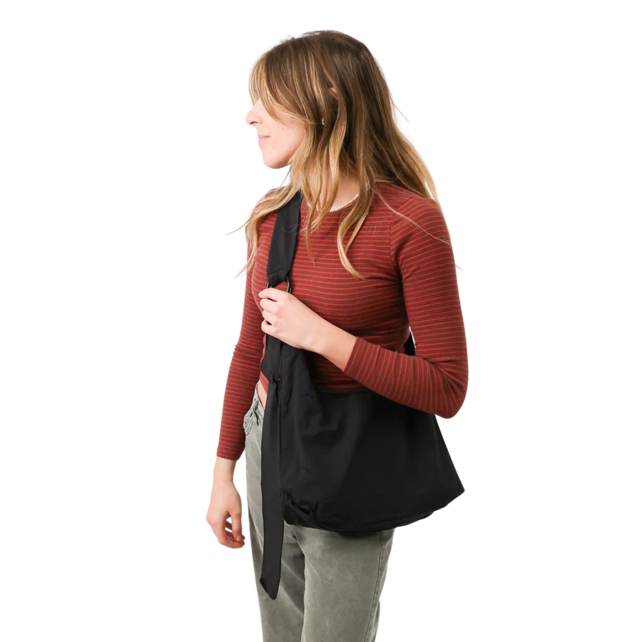 Black thread slouchy shoulder bag on a white background