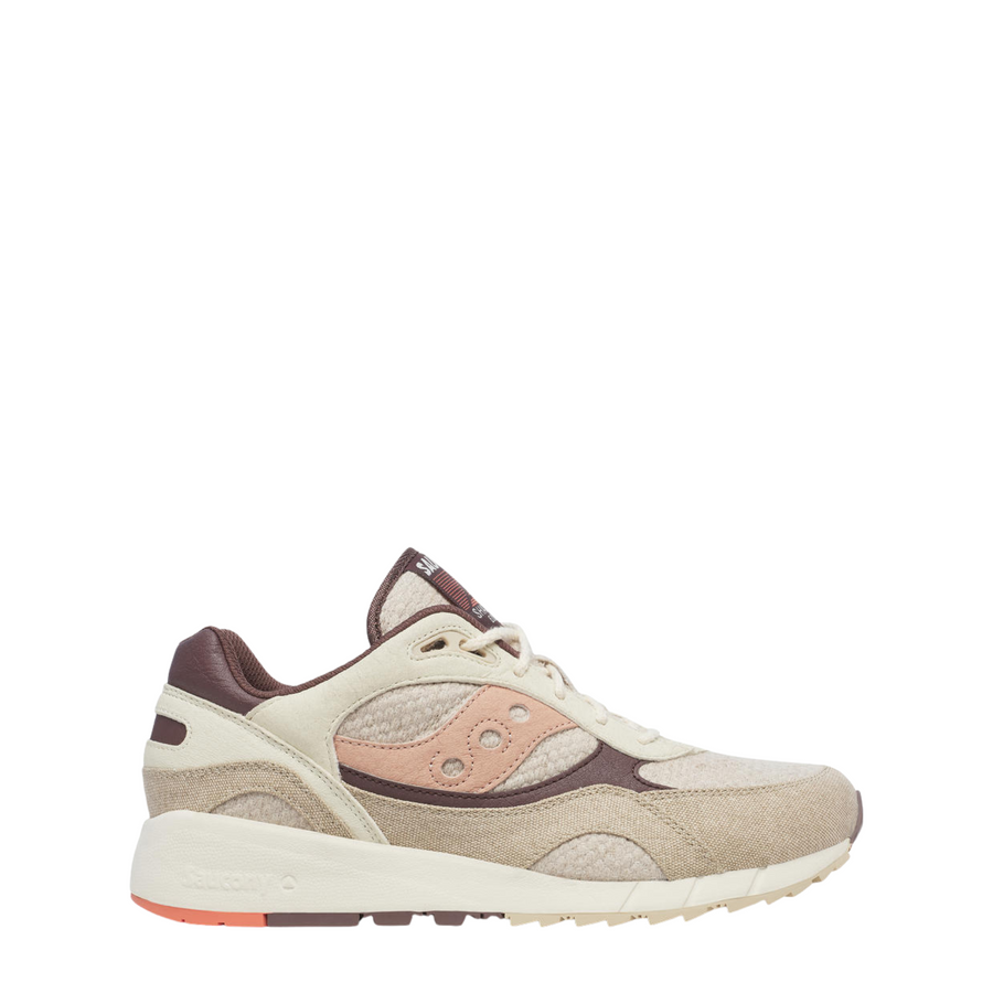 Beige saucony shadow 6000 women's sneaker with brown and pink accents on a white background