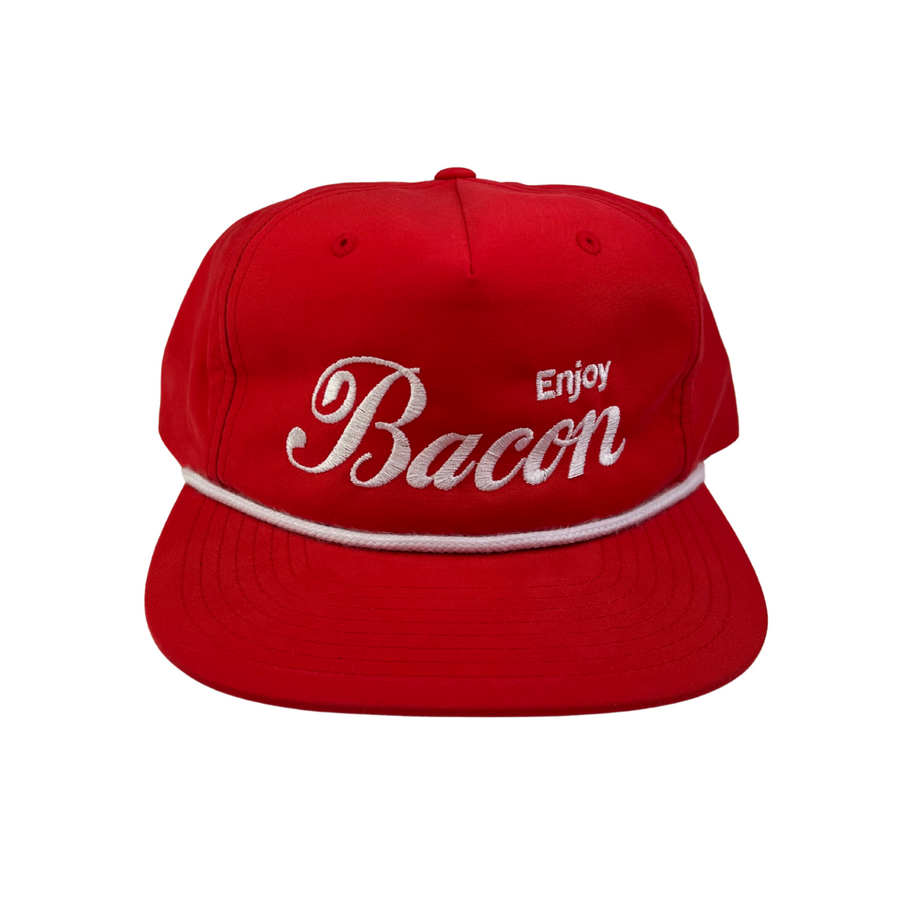 Red cap with white 'Enjoy Bacon' text on a white background