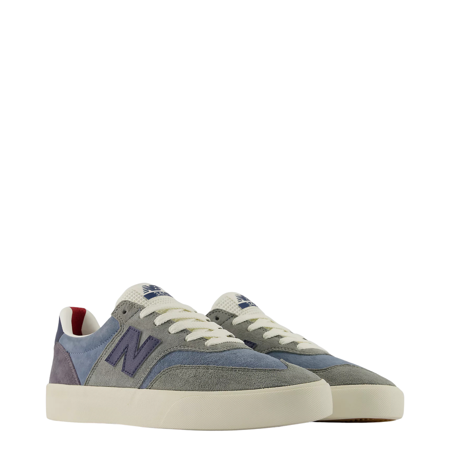 men's new balance numeric 340 skateboard Sneaker with blue and gray design on a white background