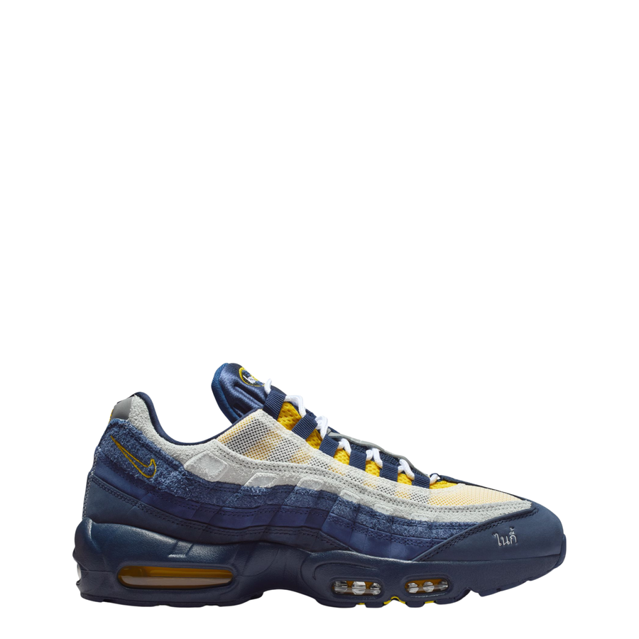 Blue and yellow nike sb air max 95 eric koston sneaker on a white background