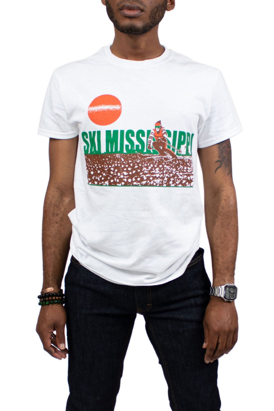 tee shirt featuring the ski mississippi logo in green brown and orange