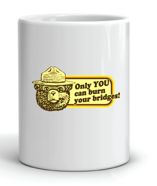 Gray t-shirt with a graphic design featuring a smokey the bear and text that reads only you can burn your bridges on a white background